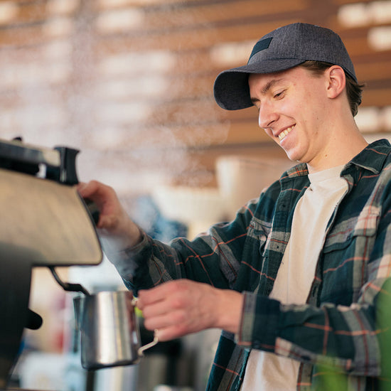 Kirkland Zoka employee making coffee