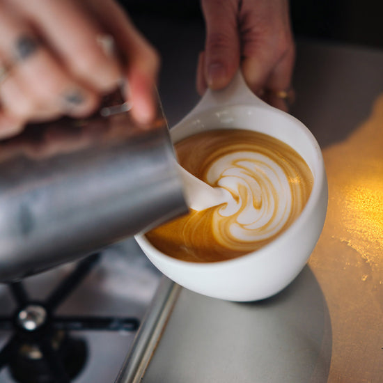 South- Lake Union Zoka employee making coffee