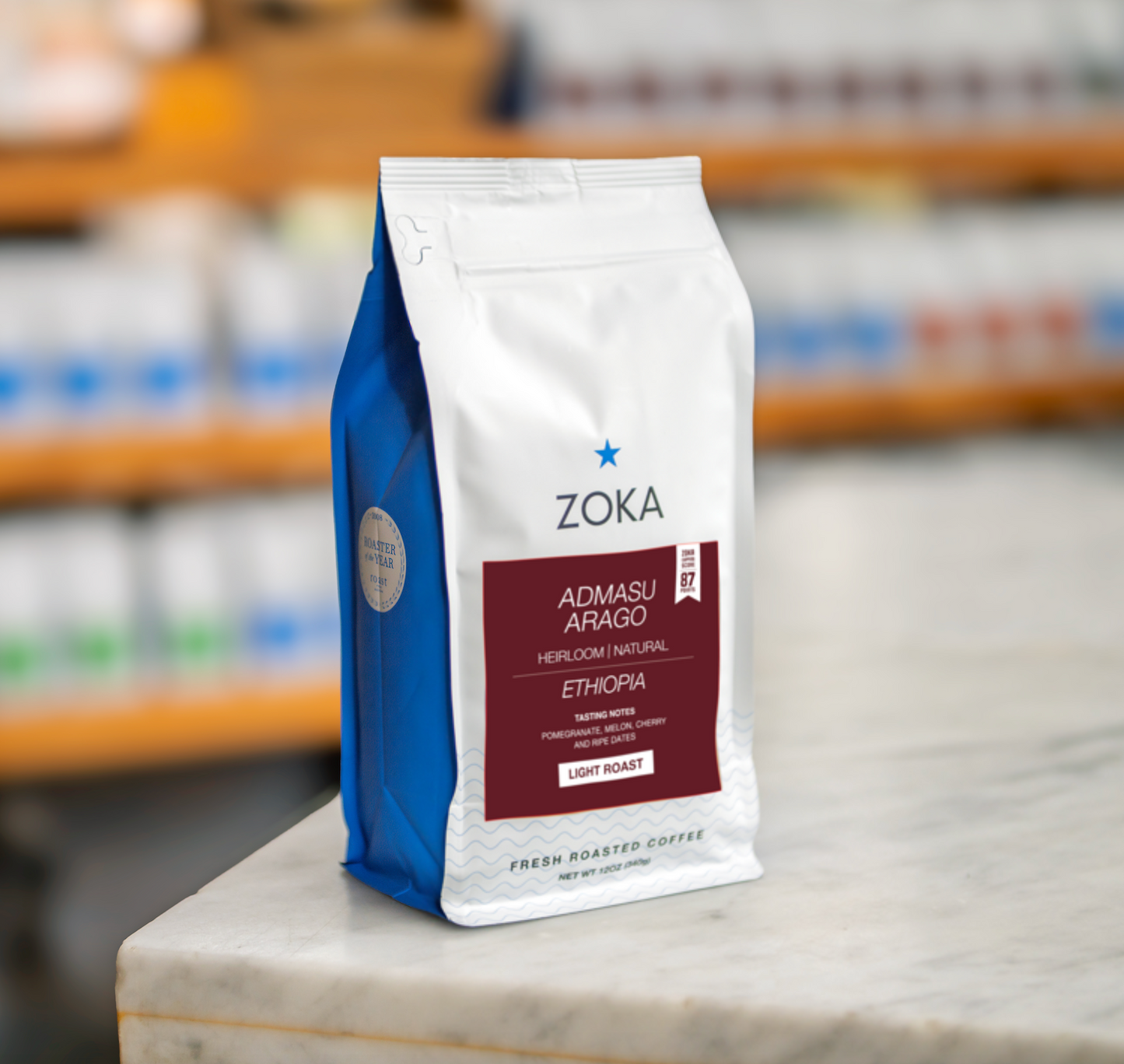 Zoka coffee bag on a counter with a blurred store background