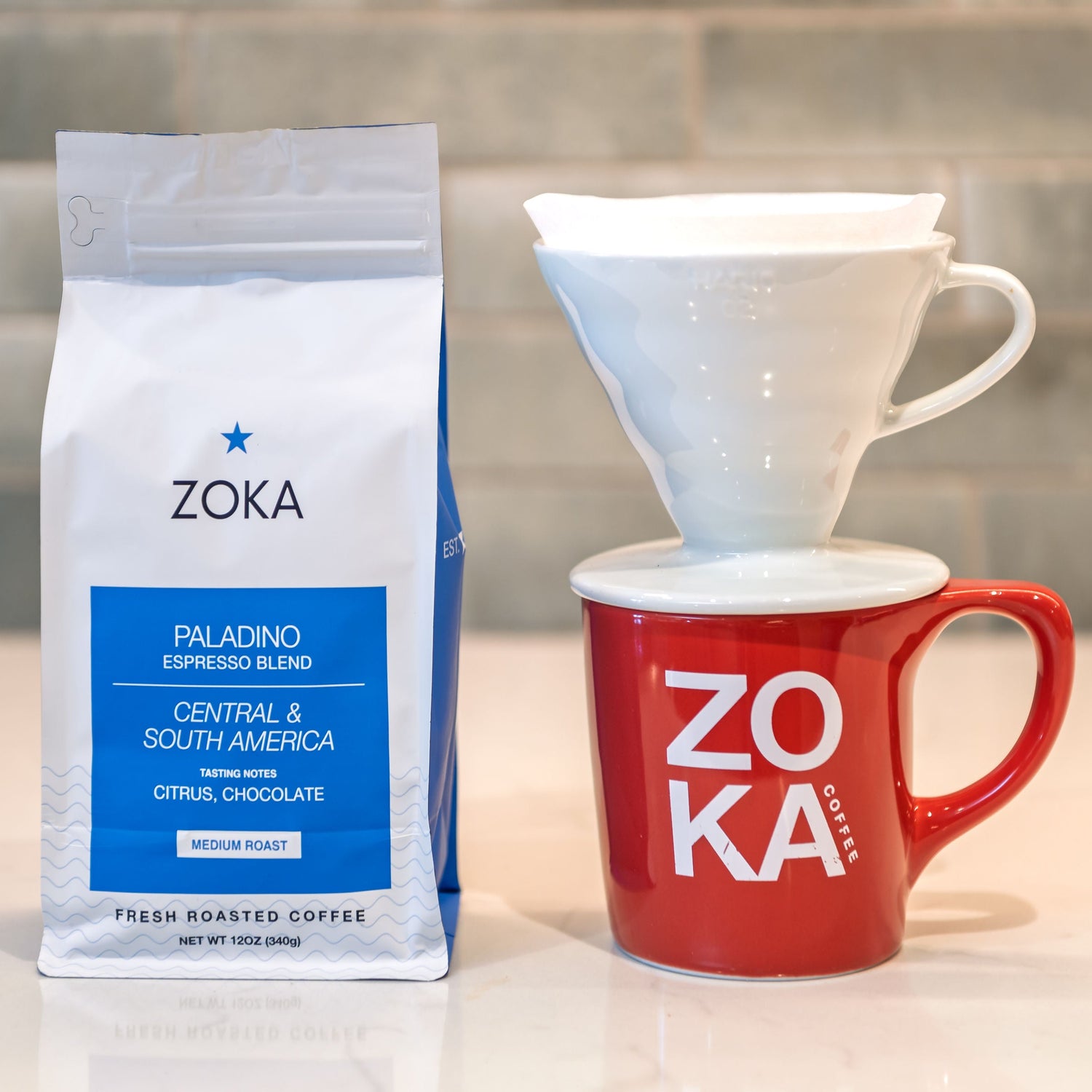 Zoka coffee package and mug on a kitchen counter